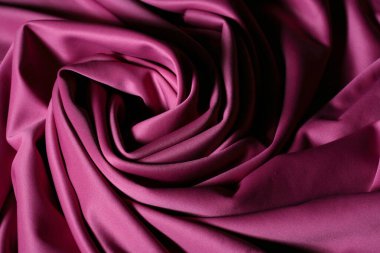 Doku, arka plan, desen. Pembe kumaş dokusu. Gündelik elastik malzeme neopren olarak adlandırılır, değişken kullanım, kullanımı kolaydır. Üst görünüm