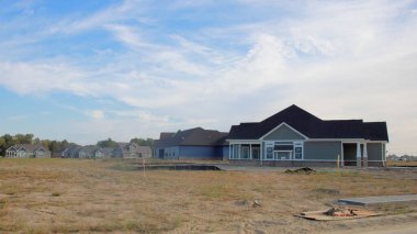 A home building boom leads to new home construction in the suburbs in the midwest. Greenfield, Indiana. clipart