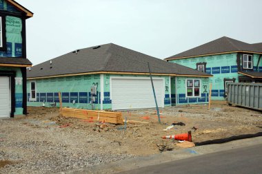 Greenfield, Indiana, USA - September 22 2024: A home building boom leads to new home construction in the suburbs in the midwest. Greenfield, Indiana. clipart