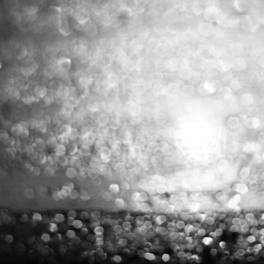Soyut arkaplan, gri bokeh ışıkları / kıvılcımlar