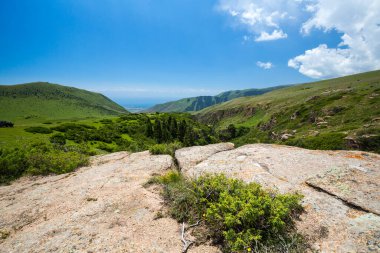 Panoramic view of Tianshan Mountains in Kyrgyzstan, Central Asia clipart