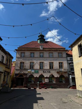 Town hall building in Biskupiec, Poland clipart