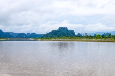 River flow, natural stream and the beautiful fresh green nature and mountain in the south of Laos 