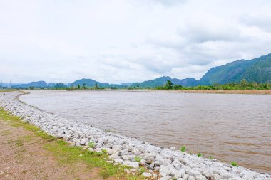 River flow, natural stream and the beautiful fresh green nature and mountain in the south of Laos 