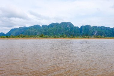 River flow, natural stream and the beautiful fresh green nature and mountain in the south of Laos 