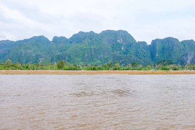 River flow, natural stream and the beautiful fresh green nature and mountain in the south of Laos 