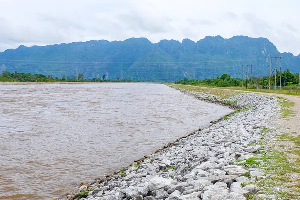 River flow, natural stream and the beautiful fresh green nature and mountain in the south of Laos 