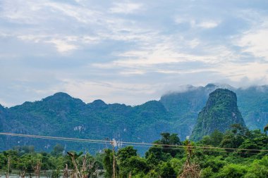 Beautiful green nature, trees in the water and mountain in the south of Laos, Khammuane province 