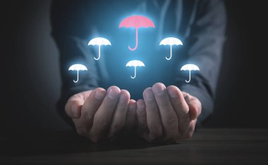 Şemsiye tutan adam. Liderlik. İş dünyası