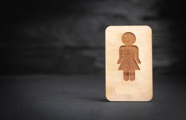 Siyah arka planda tahta dişi sembolü.