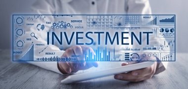 Finansal grafiklerle yatırım kavramı.