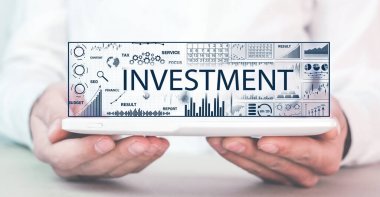 Finansal grafiklerle yatırım kavramı.
