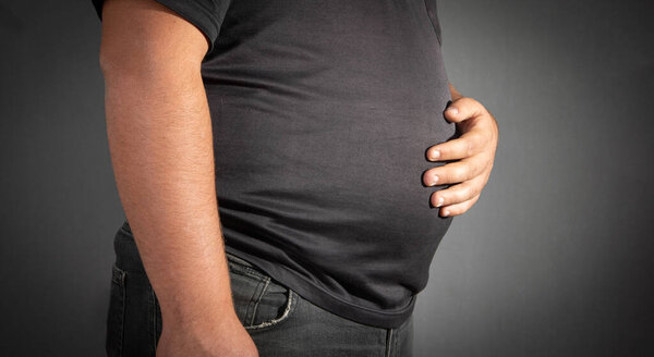 Caucasian fat man with big belly.