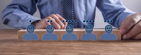 Human icons with positive and sad face, stars. Customer evaluation and satisfaction