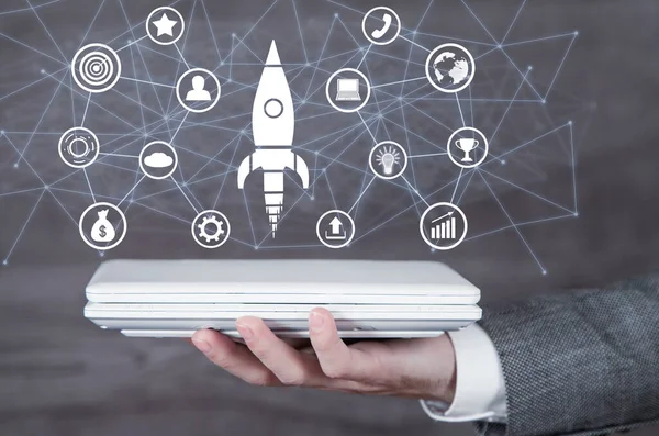 Rocket with a business icons and network. Business. Startup