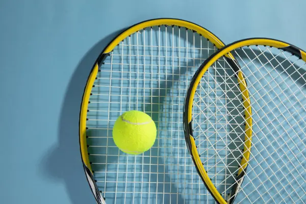 Tennis ball and rackets. Sport. Hobby