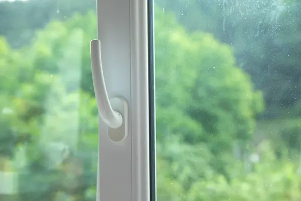 White plastic pvc window at home.
