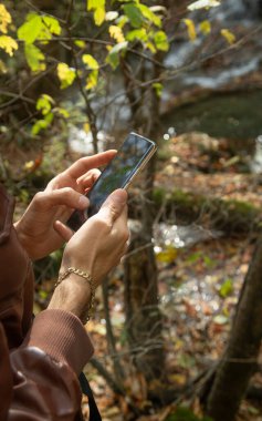 Man taking nature by smartphone. Hobby. Travel