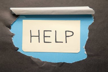 Bir kağıda yazılmış yardım iletisi. 