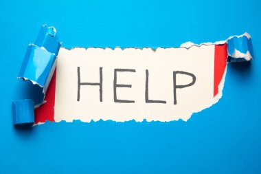 Bir kağıda yazılmış yardım iletisi. 