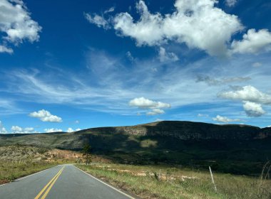 Road in the mountains, towards green mountains, with lush landscape 