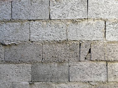 Fotoğraf arkaplanı inşaatı için beton blok duvar hazırlanıyor. Blok konsepti. İnşaat konsepti