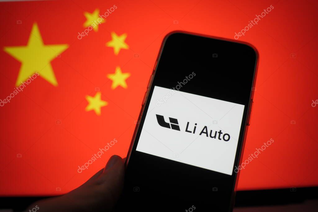 Roosendaal, The Netherlands - February 15, 2025: A mobile phone displaying the logo of Li Auto, with the Chinese flag in the background.