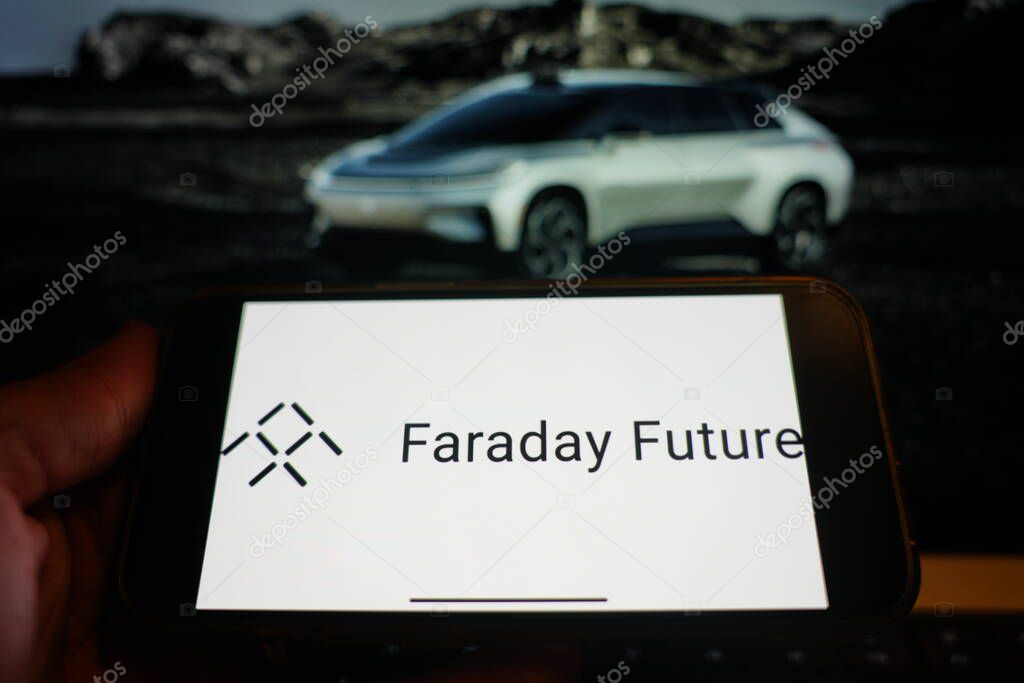Roosendaal, The Netherlands - February 16, 2025:A mobile phone displaying the logo of Faraday Future, with the company website in the background.