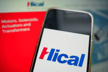 Roosendaal, The Netherlands - February 19, 2025: A mobile phone displaying the logo of Hical Technologies, with the company website in the background. clipart