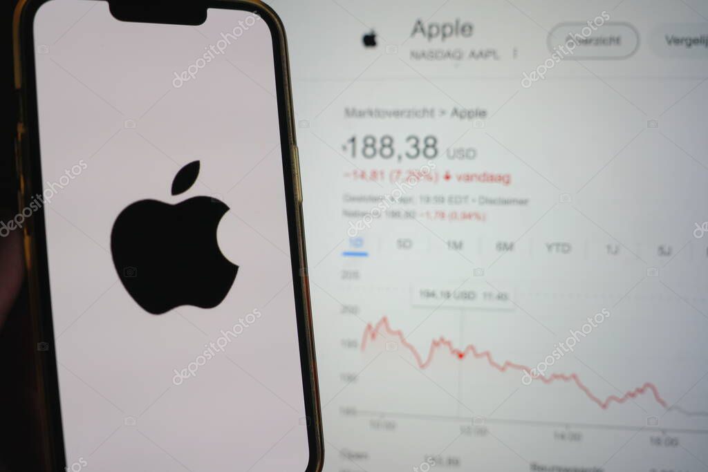 Roosendaal, The Netherlands - April 6, 2025: A mobile phone displaying the logo of Apple, with the recent falling stock after the recent tariffs announcement by the Trump administration.