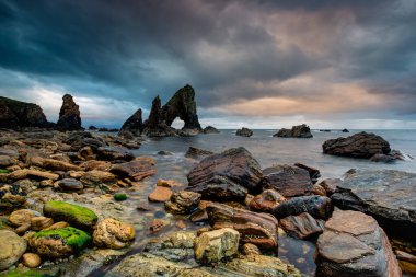 Beautiful sunset at Crohy Arch, Crohy Head, County Donegal, Ireland clipart