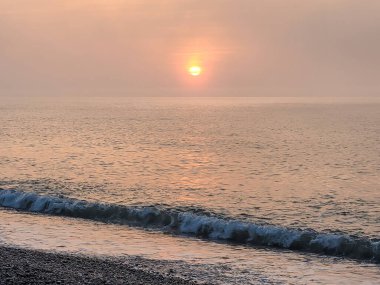 Deniz sahilde günbatımı