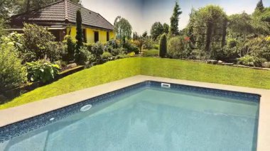 Huzurlu ve dingin bir havuz manzarası. Canlı bir bahçe ve yakınlarda büyüleyici bir ev.