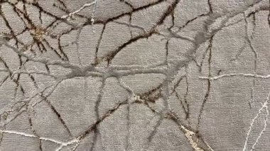 Kalıplaşmış gri yüzey görüntüsü. Karmaşık ve detaylı çatlaklar ve desenler.