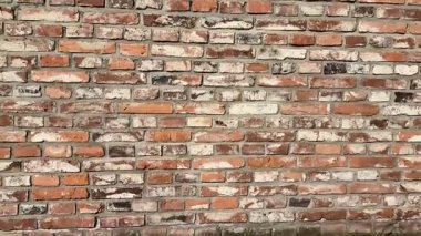 Çeşitli ortamlarda arka plan ve tasarım elementleri olarak kullanılmak için mükemmel yüksek kalite desenli tuğla bir duvar