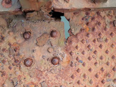 Bridge detail rust. Levensau Railway High Bridge, built 1894, rusted parts, replacement underway. Historic landmark, shipping route, industrial heritage. clipart