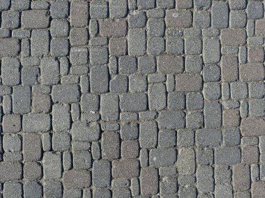 Yayalar ve bisikletçiler için bir trafik alanı olarak çok biçimli asfaltlama istikrarlı, dayanıklı ve yapılandırılmış bir yüzey yaratır. Metin için boşluk