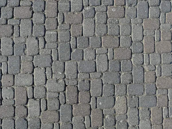 Yayalar ve bisikletçiler için bir trafik alanı olarak çok biçimli asfaltlama istikrarlı, dayanıklı ve yapılandırılmış bir yüzey yaratır. Metin için boşluk