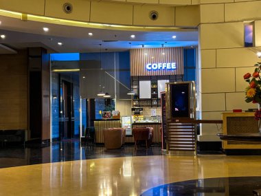 tangerang, indonesia - june 22, 2025 : a coffee shop located in the lobby of a hotel in tangerang city 