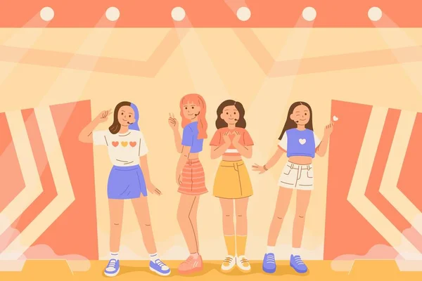 K-pop kız grubu gösterişli bir sahnede duruyor. Müzisyenler sahnede dans edip şarkı söylüyorlar.