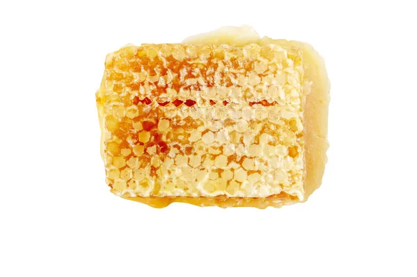 蜂窝状六角形细胞中的蜂蜜 由蜡制成 在白色上分离 蜂蜜糖 — 图库照片