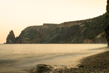 deniz kıyısında gün batımı