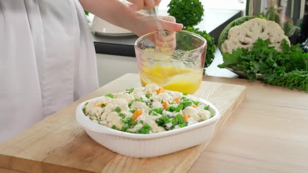 Woman Preparing Healthy Breakfast Cauliflower Casserole Woman Hand Pours Egg — Stock Video