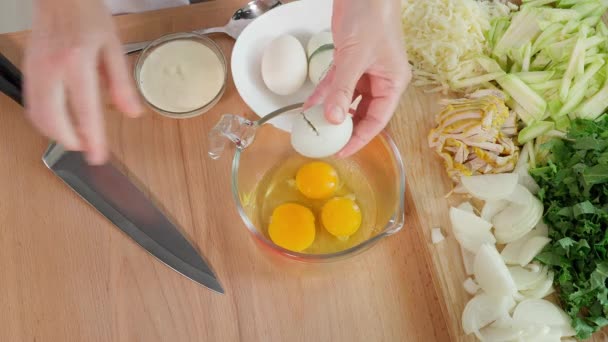 Woman Hands Breaking Eggs Glass Measuring Cup Preparing Healthy Breakfast — Stock Video