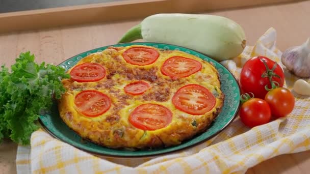 Ready Omelette Tomatoes Zucchini Cheese Herbs Frittata Plate Wooden Table — Stock Video