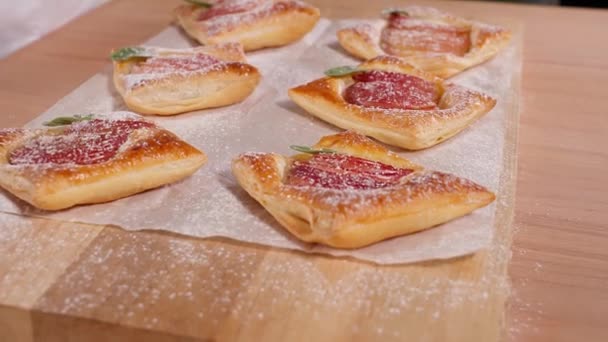 Freshly Baked Beautiful Puff Pastries Apples Sprinkled Powdered Sugar Wooden — Stock Video