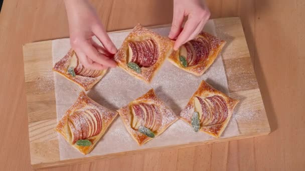 Chef Hands Demonstrate Freshly Baked Puff Pastries Apples Powdered Sugar — Stock Video