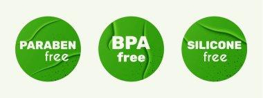 Silikon, paraben, BPA yok. 3 yuvarlak yeşil kağıt logo yapıştırılmış. Kimyasal koruyucuları olmayan plastik bir simge. Beyaz arkaplanda vektör sembolü