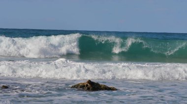 kum üzerine çökmesini dalgaları