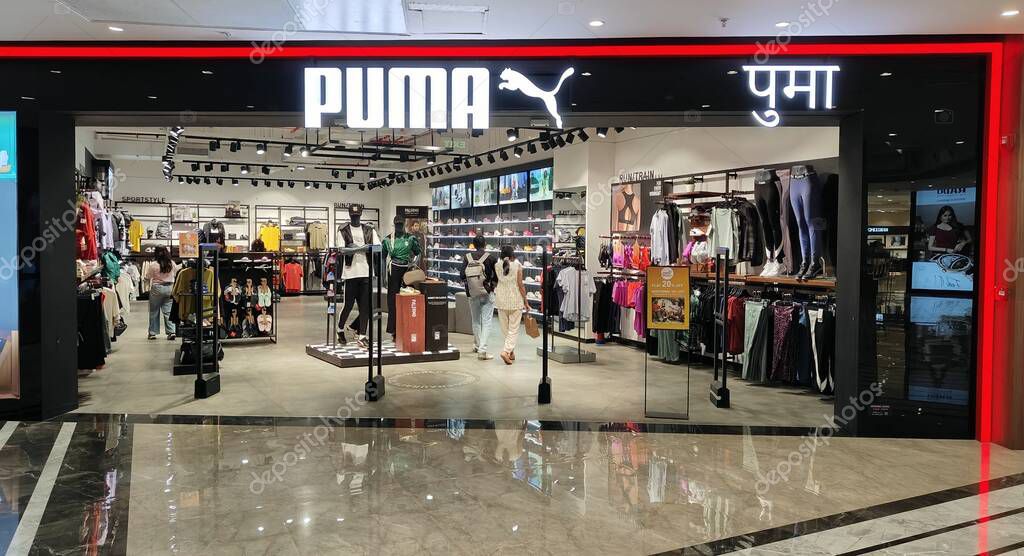 Puma store front at a modern shopping mall, showcasing activewear, footwear, and sports fashion with customers browsing the latest athletic collections. 12 April 2025 Pune, India